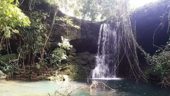 Waterfall at Rivona Buddhist Cave in Goa