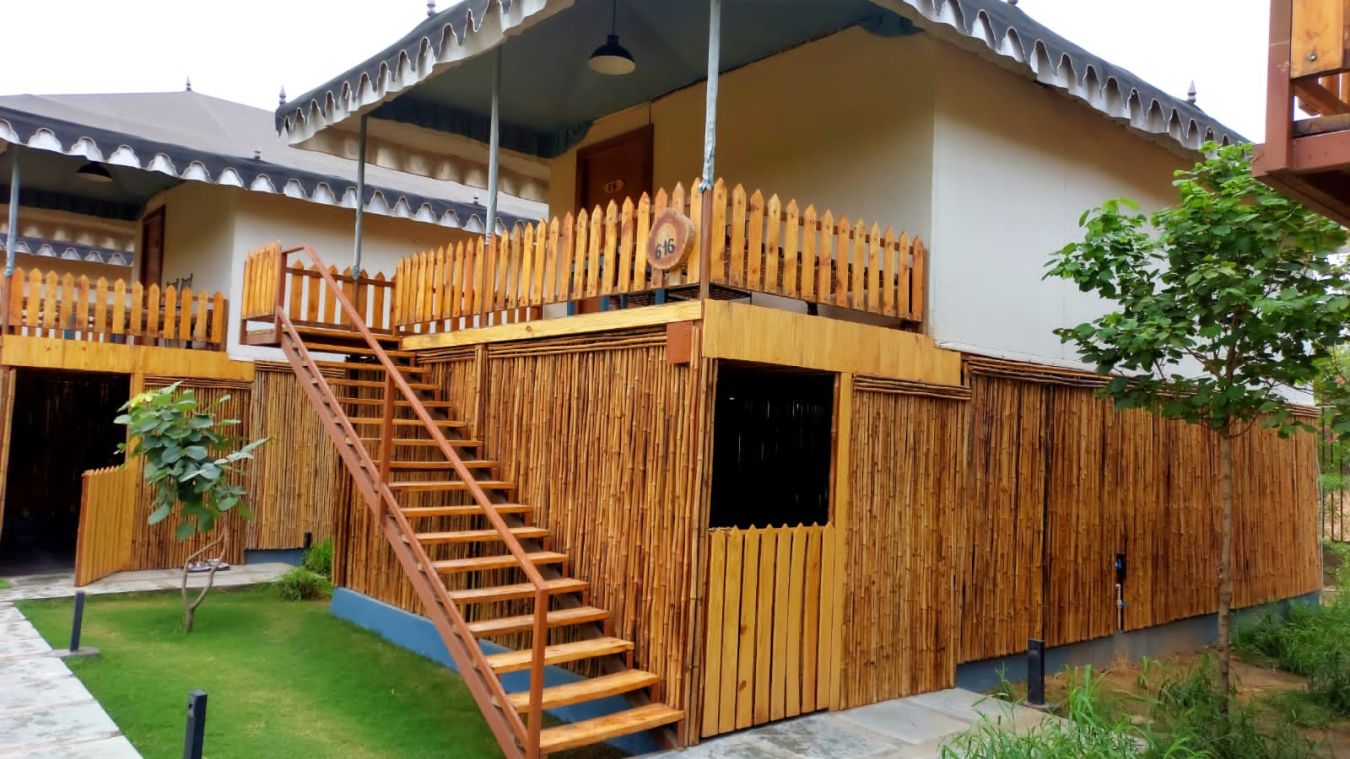 wooden stairs beside a wooden open door 2