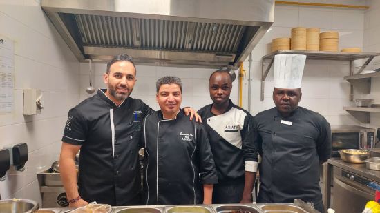 The chefs of Asiatic Lounge restaurant in Kenya standing