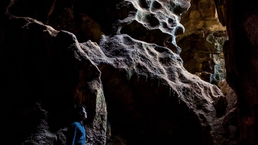 An explorer visiting the bat caves in Shillong