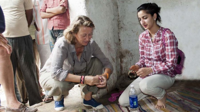 a tourist trying out bangles