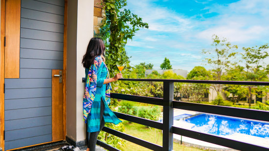 Balcony with garden view in Pool View Suite- The Golden tusk