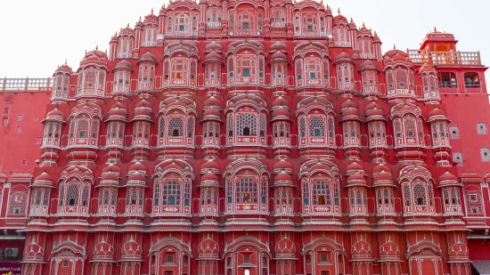 low-angle-photography-of-red-multi-storey-building-3581369