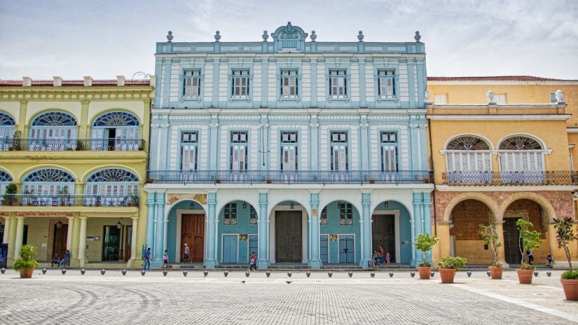 Facade of a hotel on a well lit day