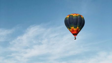 a hot-air balloon flying in the sky