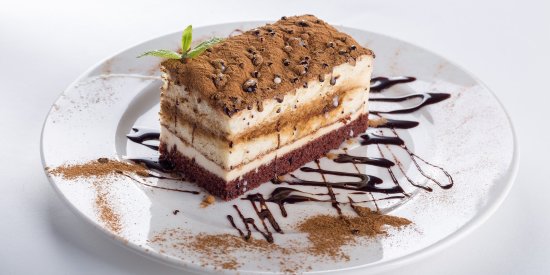 a layered cake served on a plate