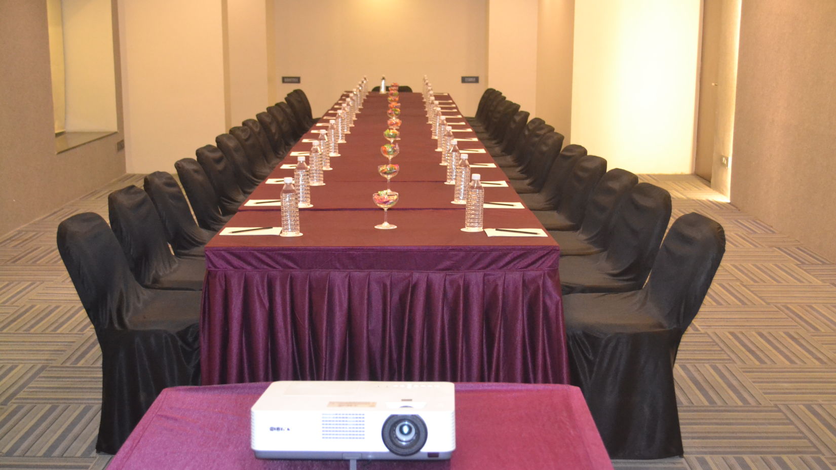 Rectangle table seating arrangements inside a banquet hall - VITS Sharanam, Thane