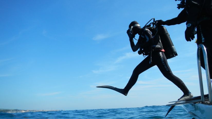 A person ready to scuba dive