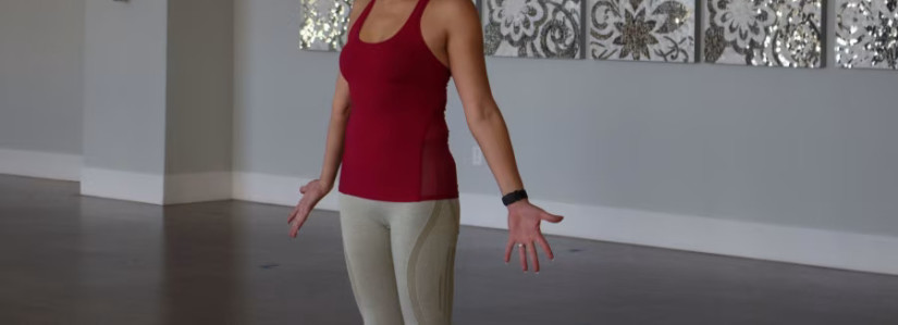 A woman practicing breathing exercises in yoga.
