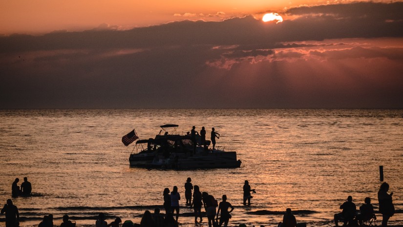 silhouette of a boat at sea