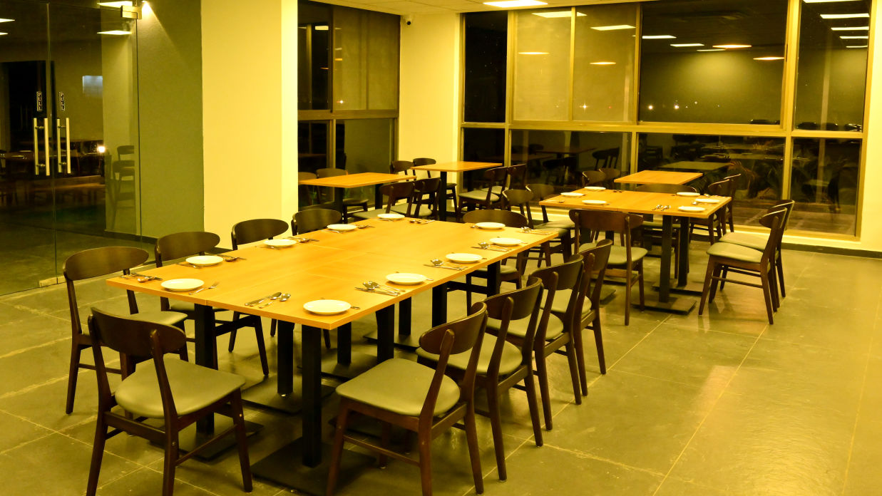 Well lit dining arrangement 3 - Clarks Inn Express, KRS Road, Mysore