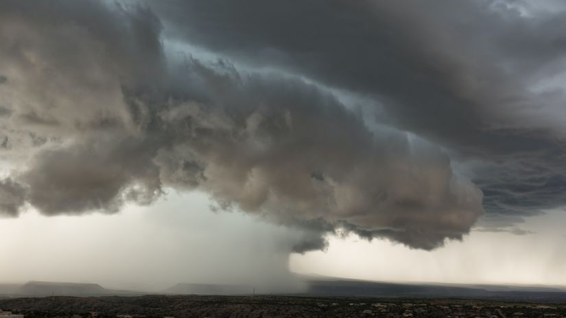 a large cloud over a city