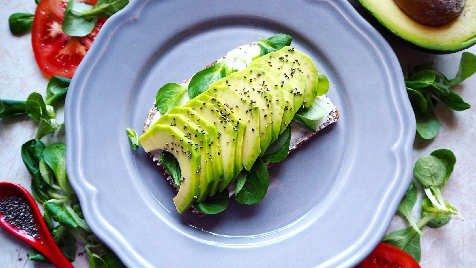 a decorated platter of avocados cut into pieces