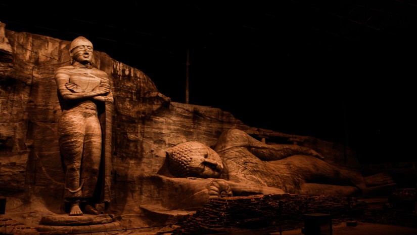 Buddha statues in rock formation