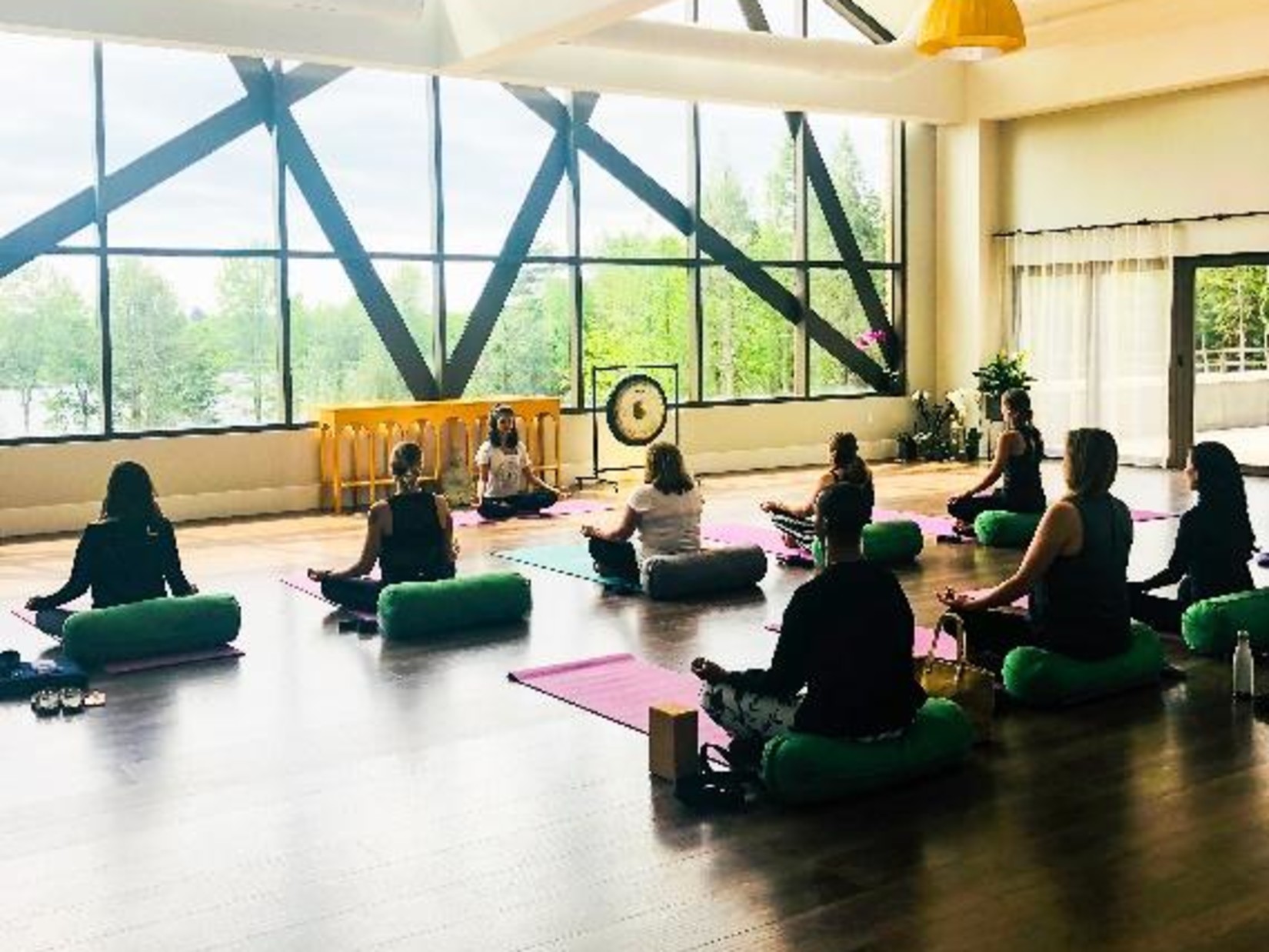 people meditating in a room