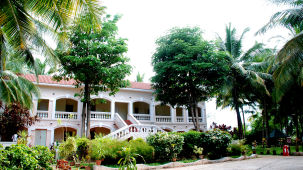 facade image of Black Thunder, Coimbatore with a few trees covering the front