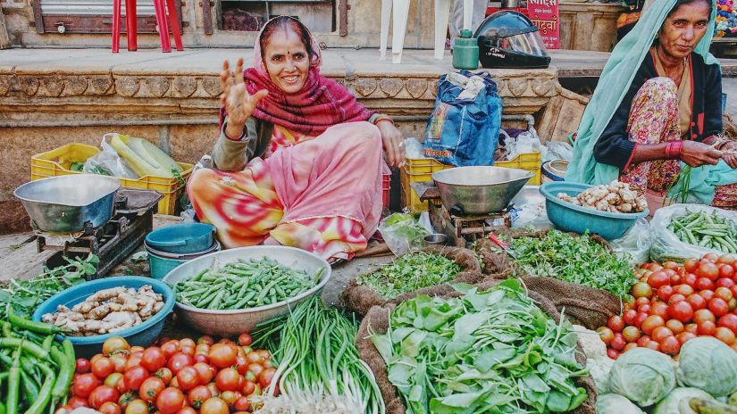 A woman selling fruits in the local market - Symphony Summer Sand Beach Resort and Spa