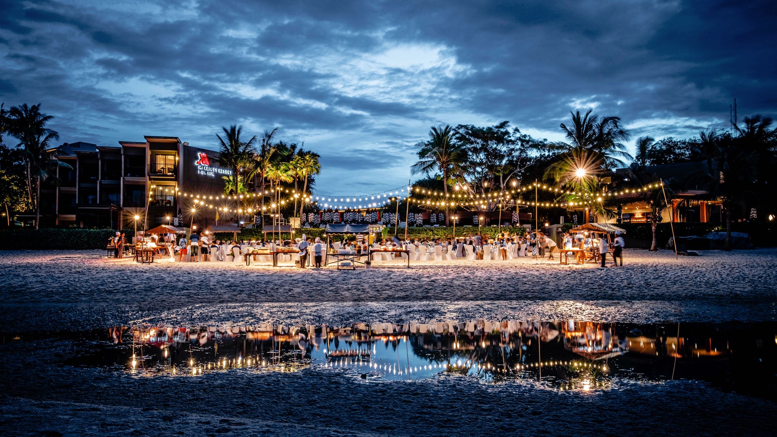 beach party with lights by the sea