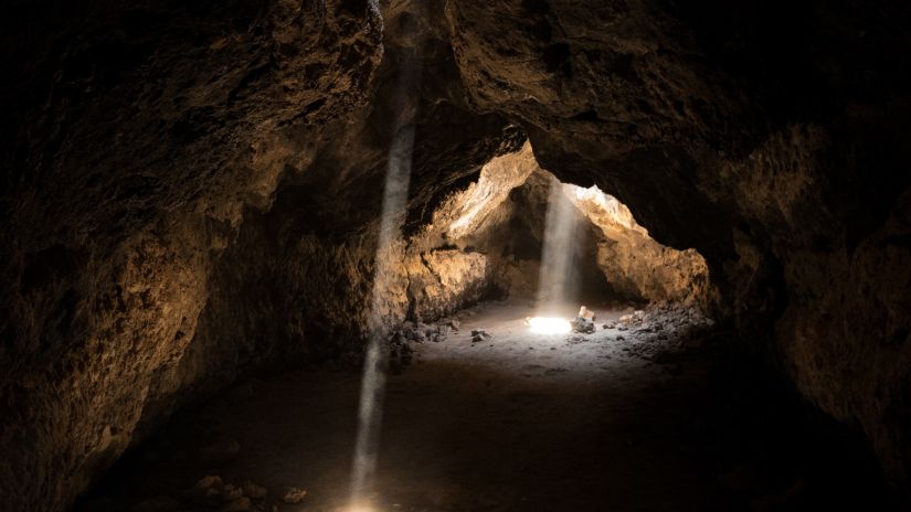 Light entering through holes of a cave