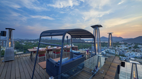 alt-text Seating arrangements on rooftop at Parallel Hotel, Udaipur