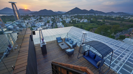 alt-text Seating arrangements on rooftop at Parallel Hotel, Udaipur