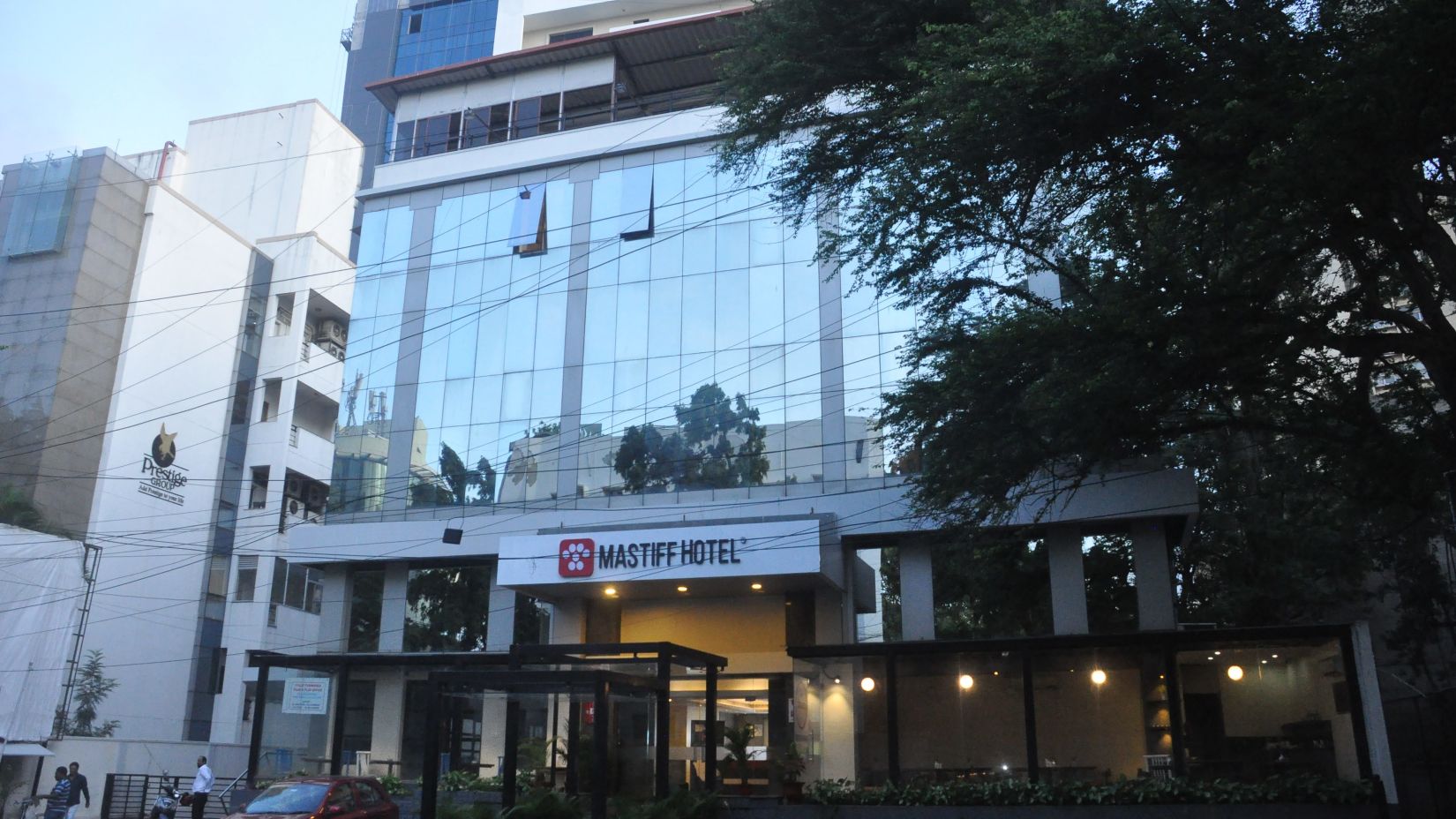 side angle view of hotel exterior shot from the road - Mastiff Infantry, Bengaluru