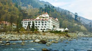 Facade of a hotel from a far angle - Mastiff Grand, Manali