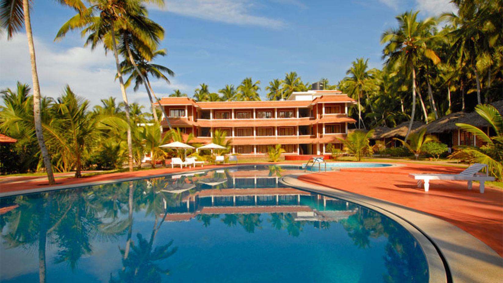 Facade image of Abad Harmonia, Kovalam as seen from near the swimming pool