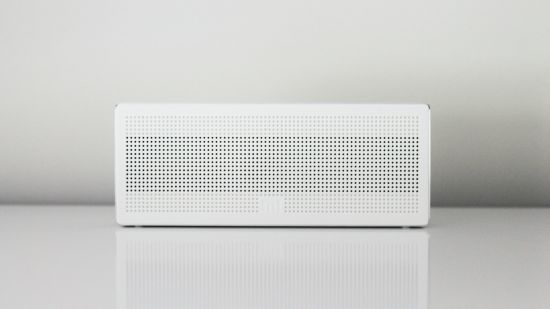 a white AC placed against a white wall