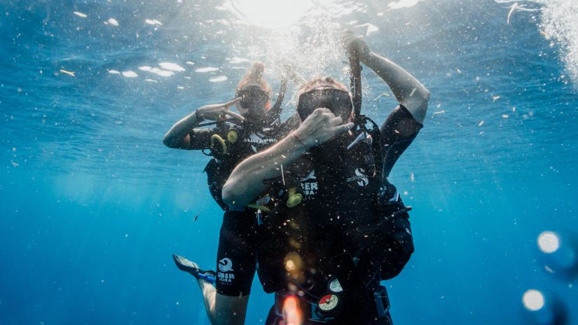 Couple scuba diving