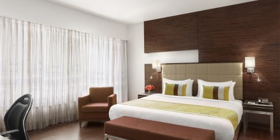 alt-text Deluxe Rooms at Suba Star Ahmedabad Hotel rooms in Ahmedabad 1