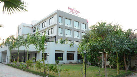 Pride Ranakpur Resort Convention Centre - image of the property facade with the crest present on the upper portion of the building