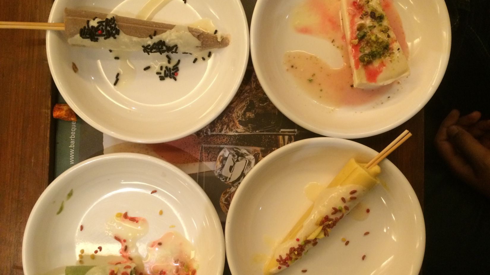 plates of different varieties of kulfi