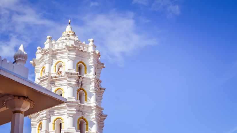 facade of a church with blue sky