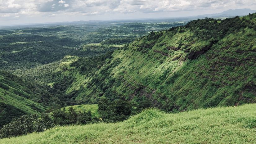 A view of the hills in Igatpuri with white clouds and in the background -Fort JadhavGADH 