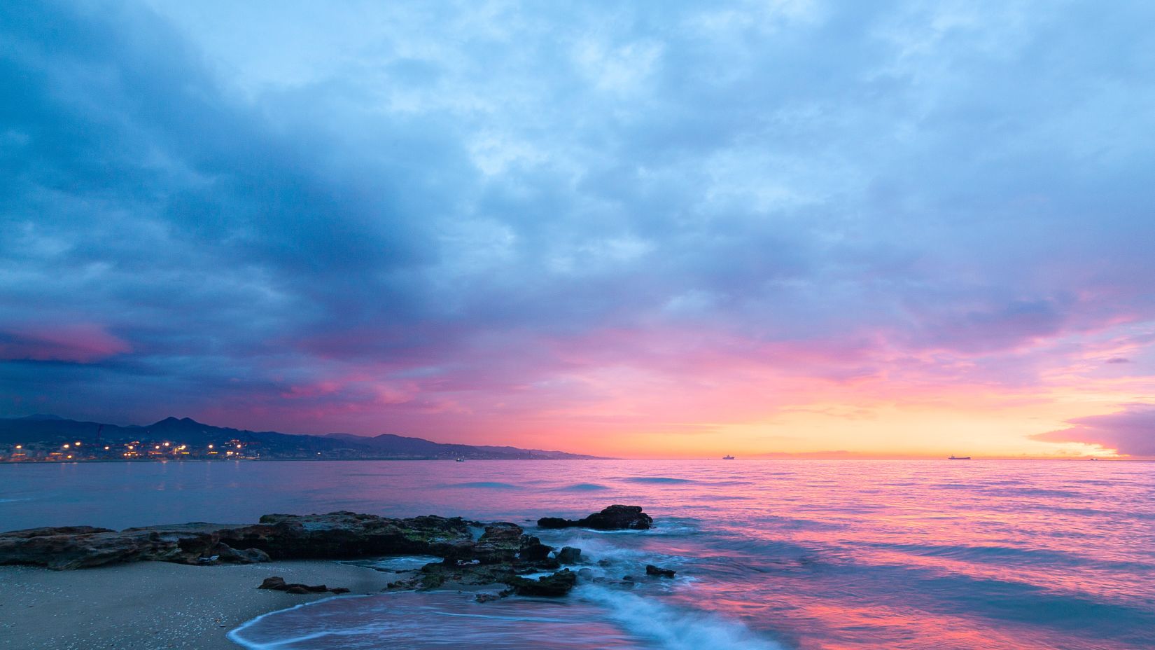 dusk at beach with blue sky