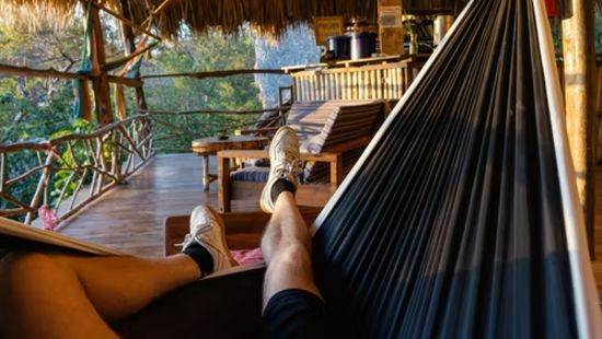 a person relaxing on a deck