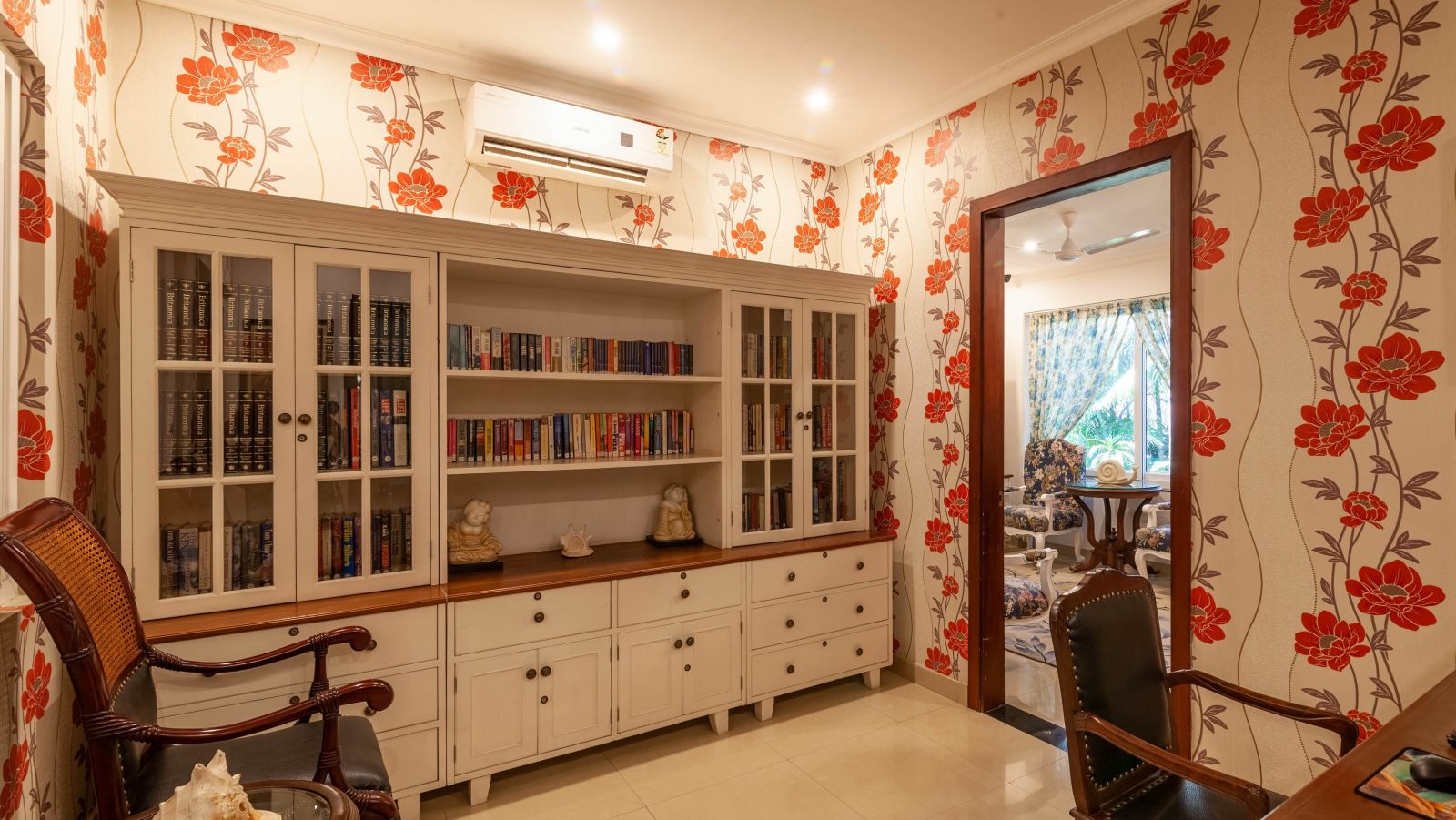 drawing room of one of the rooms equipped with shelves - luxury hotels in gopalpur- Mayfair Palm Beach Resort, Gopalpur-on-Sea