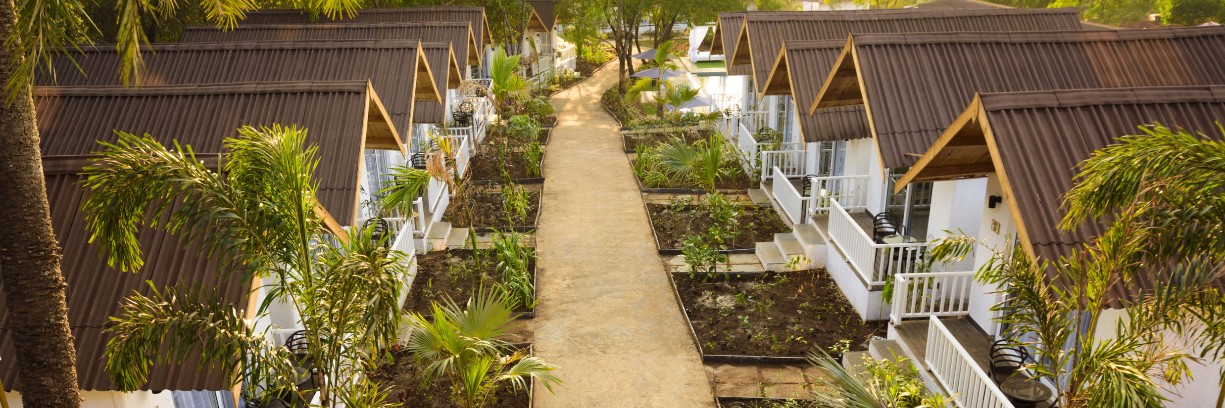 bird view of white wood resort and spa cottages - White Wood Resort, Morjim