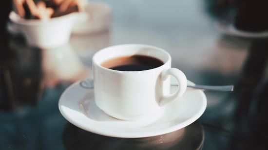 a cup of coffee on a table