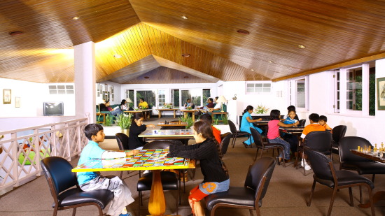 guests playing board games at The Carlton Kodaikanal 