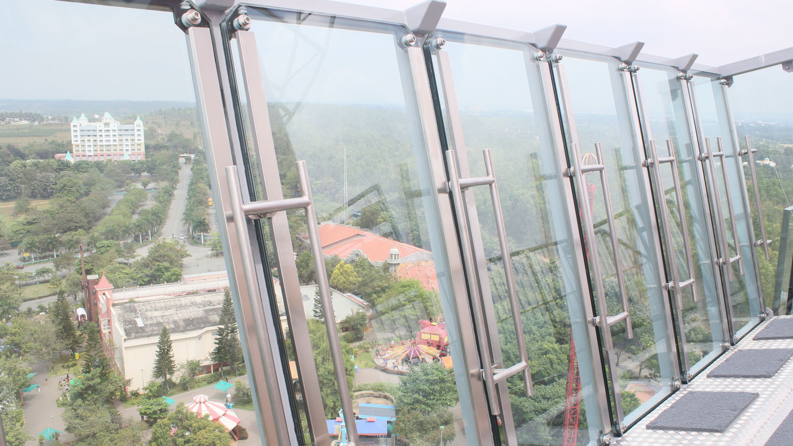 Wonderla Bengaluru Park - view of a glass barricade with metal flooring