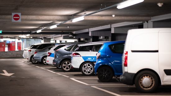 Image of cars parked neatly in parking lot