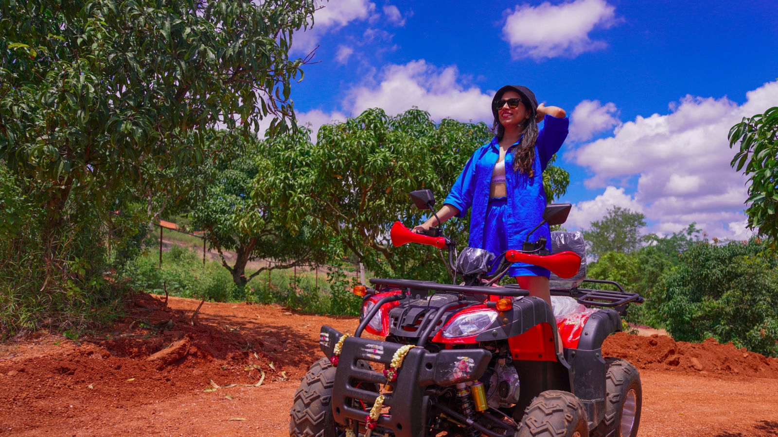 Ravishing Retreat Ramanagara - A guest standing on the ATV at our resort