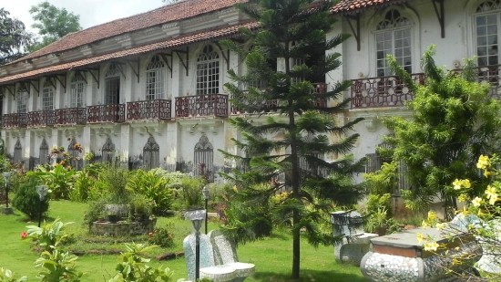 Green lawn of Menezes Braganca House in South Goa