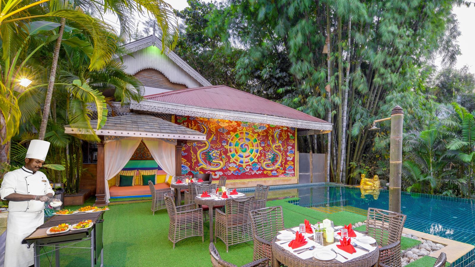 seating space and a barbecue set-up by the pool - Mayfair Spa Resort & Casino Gangtok 