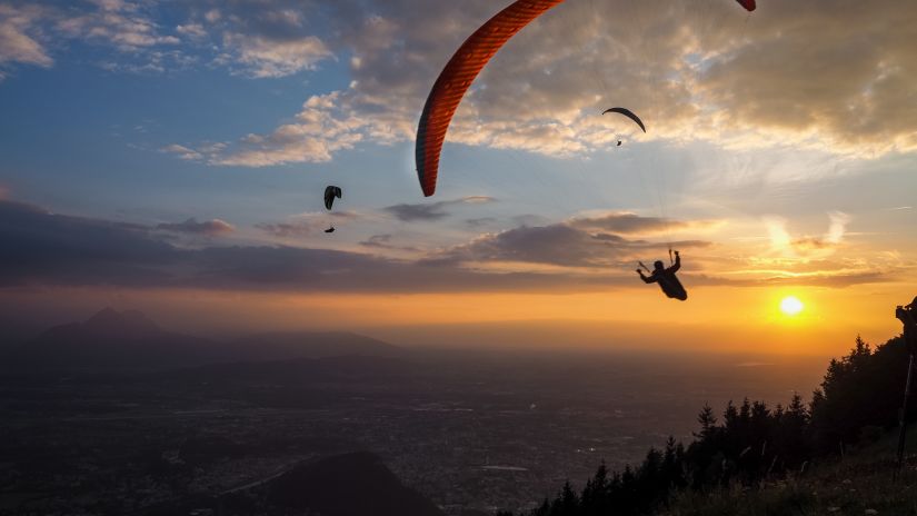 People paragliding against the evening sky  -Fort JadhavGADH 