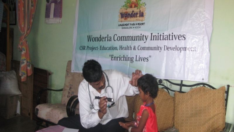 Doctor doing check-up on a kid