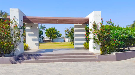 An arch at the entrance of Amber Lawn - VITS Rajkot