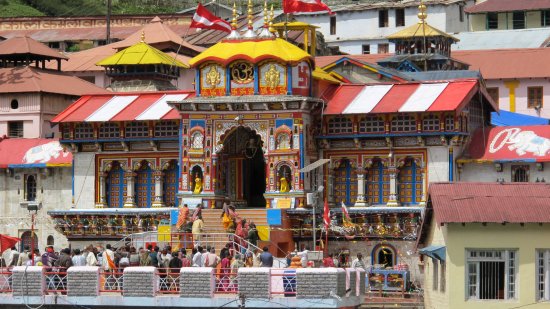 a view of vishnu temple surrounded by mountains